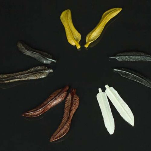 Plumas diferentes maderas
